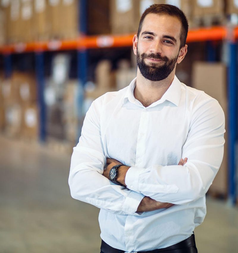 logistics-manager-posing-in-warehouse-ZHLRUEB